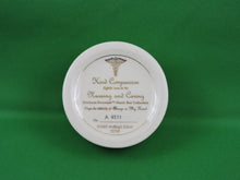 Load image into Gallery viewer, Nursing and Caring Heirloom Porcelain Music Box Collection - 2002 - "Kind Compassion"
