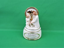 Load image into Gallery viewer, Nursing and Caring Heirloom Porcelain Music Box Collection - 2002 - "Helping Hand"