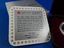 Load image into Gallery viewer, Currency - Canadian Coin - $1 - 1986 - Royal Canadian Mint - 100th Anniversary of the Inauguration of the Transcontinental Railroad and the Centenary of the City of Vancouver.
