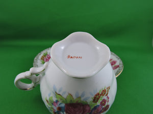 Tea Cup - Made in Japan -  White with Floral Design - Fine Bone China Tea Cup and Matching Saucer