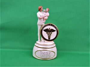 Nursing and Caring Heirloom Porcelain Music Box Collection - 2002 - "Devoted Healer"