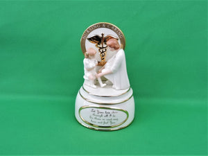 Nursing and Caring Heirloom Porcelain Music Box Collection - 2002 - "Helping Hand"