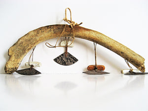 Inuit Art - Ulus Hanging From Whale Bone